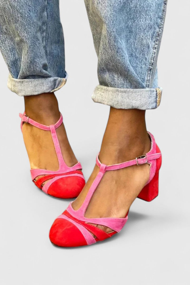 Lazariah modern heels in berry red by THE WHITMORE FAMILY, featuring sleek design and pointed toe on a white background.