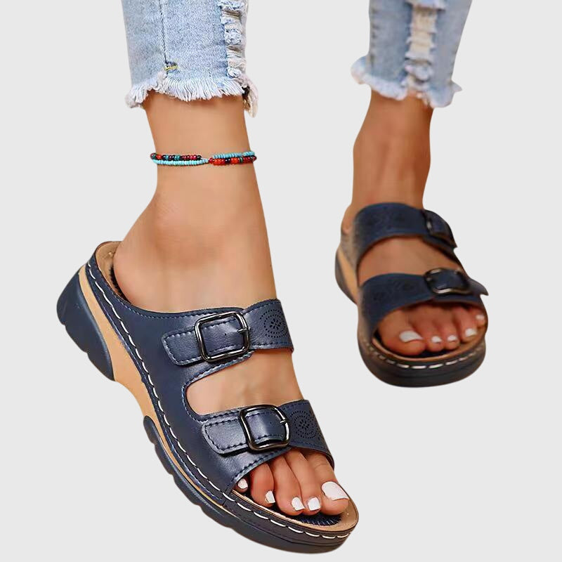 Light blue Diora™ orthopedic leather sandals by THE WHITMORE FAMILY, featuring supportive design and stylish craftsmanship.