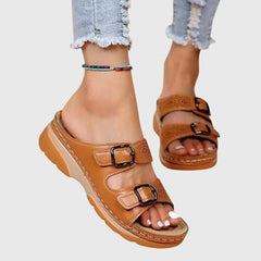 Light blue Diora™ orthopedic leather sandals by THE WHITMORE FAMILY, showcasing comfortable, stylish open-toe footwear.
