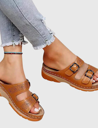 Light blue Diora™ orthopedic leather sandals by THE WHITMORE FAMILY, featuring cushioned soles and stylish design.