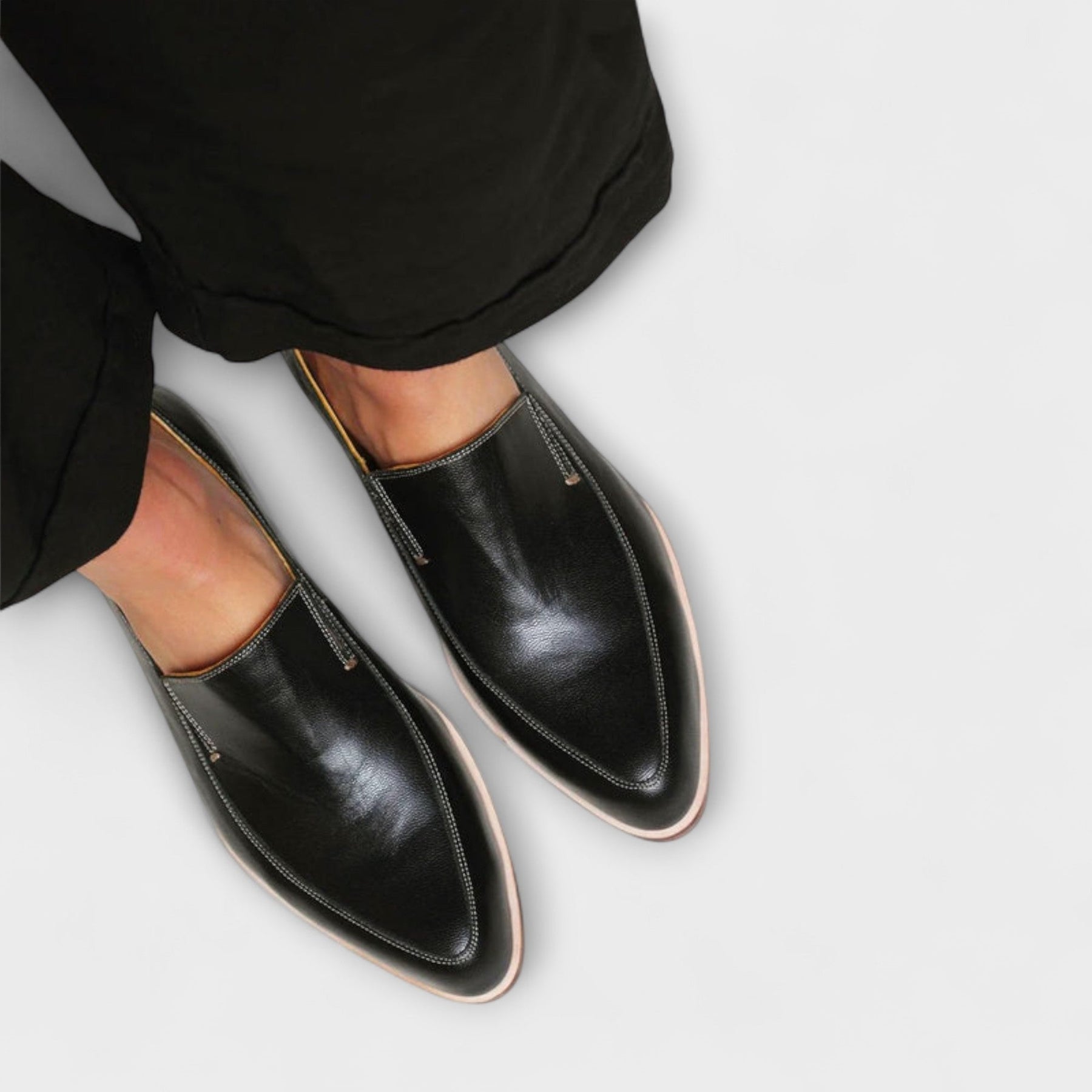 Black Jhazmiel orthopedic loafers by THE WHITMORE FAMILY, showcasing comfortable, supportive footwear for everyday wear.
