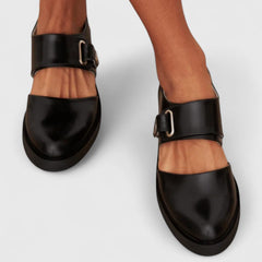 Black Lyssavelle elegant shoes by THE WHITMORE FAMILY featuring a sleek design and stylish silhouette.