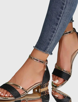 Black Alison™ orthopedic heeled sandals by THE WHITMORE FAMILY with supportive insoles and stylish block heels.