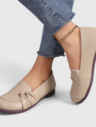 Black Ivarynn elegant shoes by THE WHITMORE FAMILY, featuring sleek design and comfortable fit for stylish occasions.