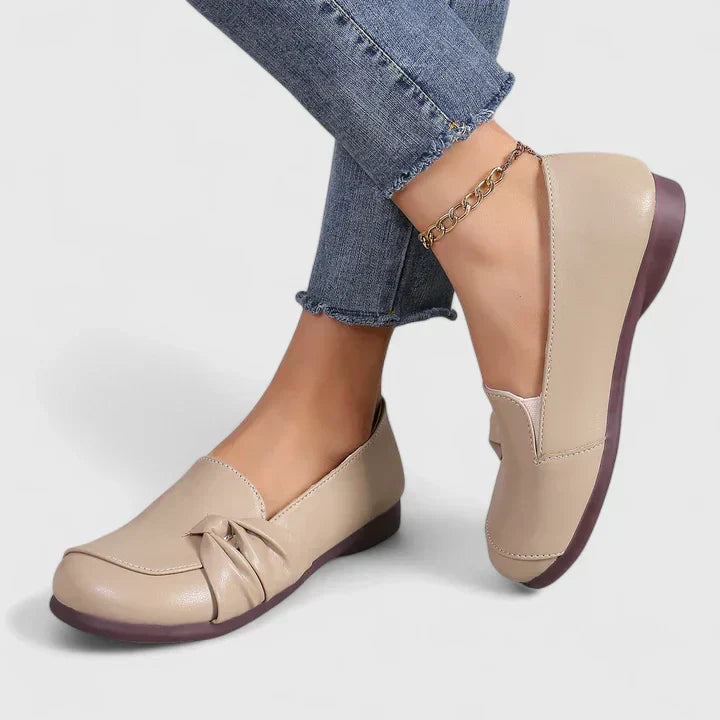 Black Ivarynn elegant shoes by THE WHITMORE FAMILY, featuring sleek design and comfortable fit for stylish occasions.