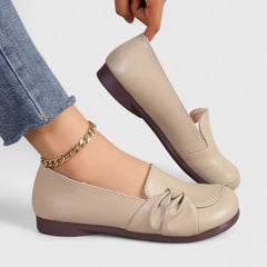 Black Ivarynn elegant shoes by THE WHITMORE FAMILY, featuring a sleek design and stylish silhouette.