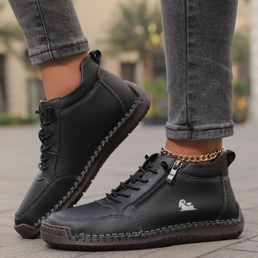 Black Alyse™ ergonomic support sneakers by THE WHITMORE FAMILY featuring cushioned soles and supportive design for comfort.