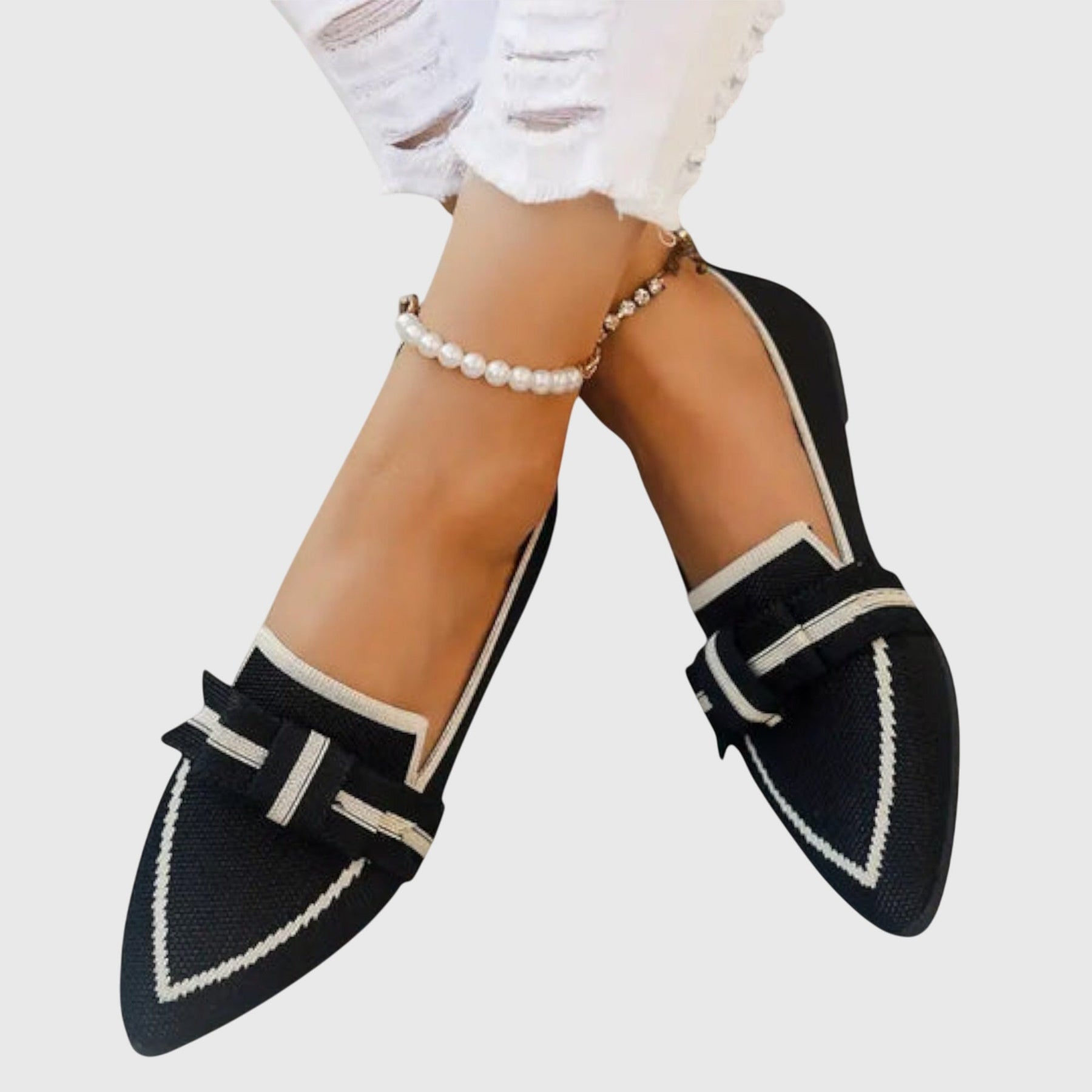 Black Blaire comfy shoes by THE WHITMORE FAMILY, featuring a sleek design and cushioned soles for everyday comfort.