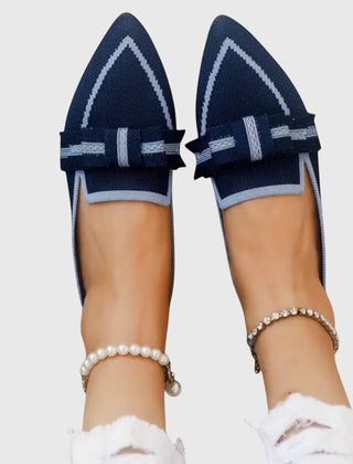 Black Blaire Comfy Shoes by THE WHITMORE FAMILY with a sleek design and cushioned sole, perfect for casual wear.