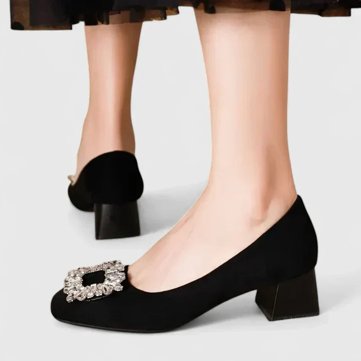 Black Julianyssa orthopaedic heels by THE WHITMORE FAMILY featuring supportive design and stylish heel for comfortable wear.