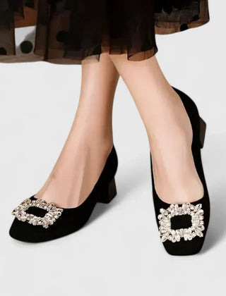 Black Julianyssa orthopaedic heels by THE WHITMORE FAMILY with supportive design and stylish appearance.