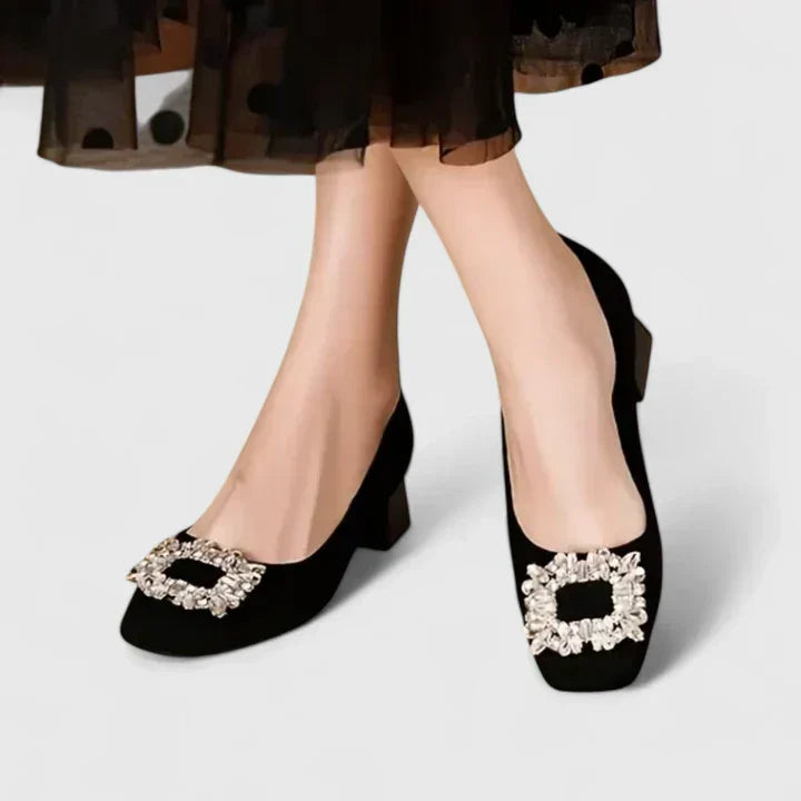 Black Julianyssa orthopaedic heels by THE WHITMORE FAMILY with supportive design and stylish appearance.