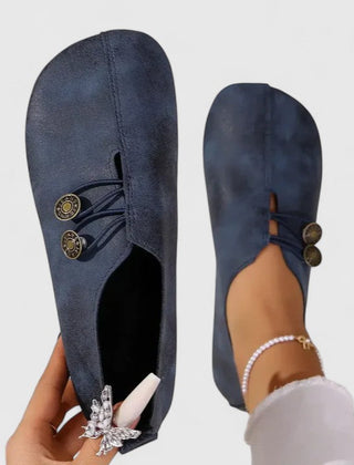 Black Kyline elegant loafers by THE WHITMORE FAMILY featuring a sleek design and smooth leather finish.