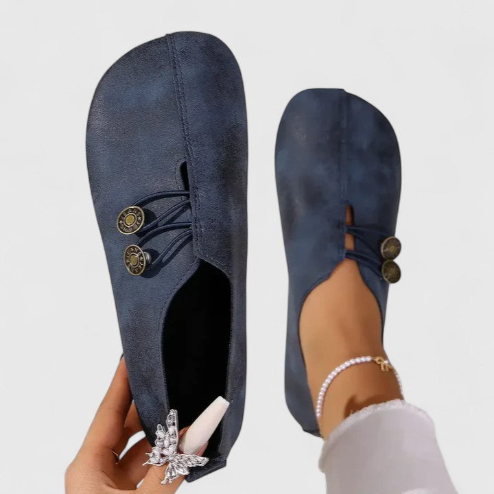Black Kyline elegant loafers by THE WHITMORE FAMILY featuring a sleek design and smooth leather finish.
