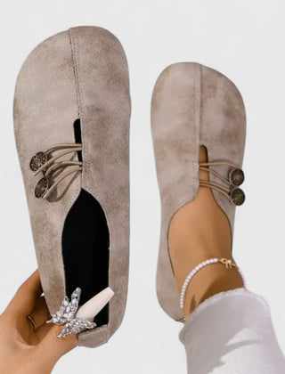 Black Kyline elegant loafers by THE WHITMORE FAMILY featuring a sleek design and comfortable slip-on style.