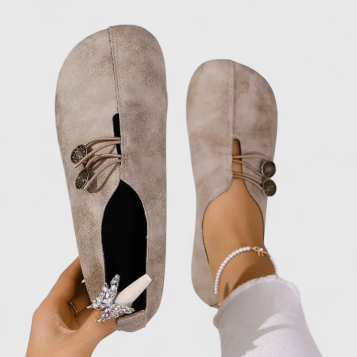 Black Kyline elegant loafers by THE WHITMORE FAMILY featuring a sleek design and comfortable slip-on style.