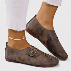 Black Kyline Elegant Loafers by THE WHITMORE FAMILY, featuring sleek design and polished finish, perfect for stylish casual wear.