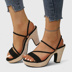 Black Lorienna sophisticated heels by THE WHITMORE FAMILY with sleek pointed toes and elegant design.