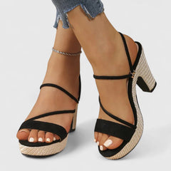 Black Lorienna sophisticated heels by THE WHITMORE FAMILY, featuring elegant pointed toes and sleek stiletto heels.