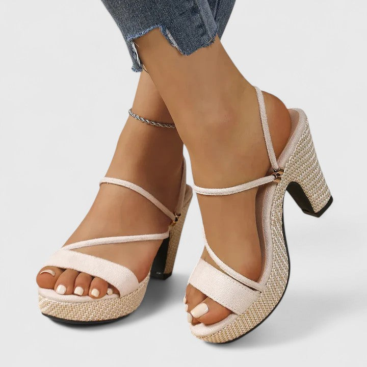 Black Lorienna sophisticated heels by THE WHITMORE FAMILY featuring elegant pointed toes and sleek design.