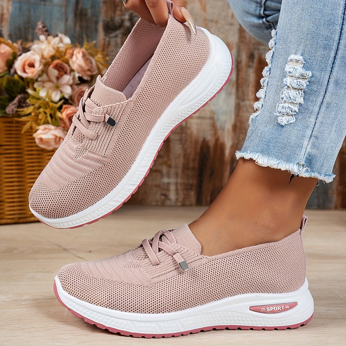 Black Louna™ ergonomic support sneakers by THE WHITMORE FAMILY with cushioned soles and breathable mesh uppers.