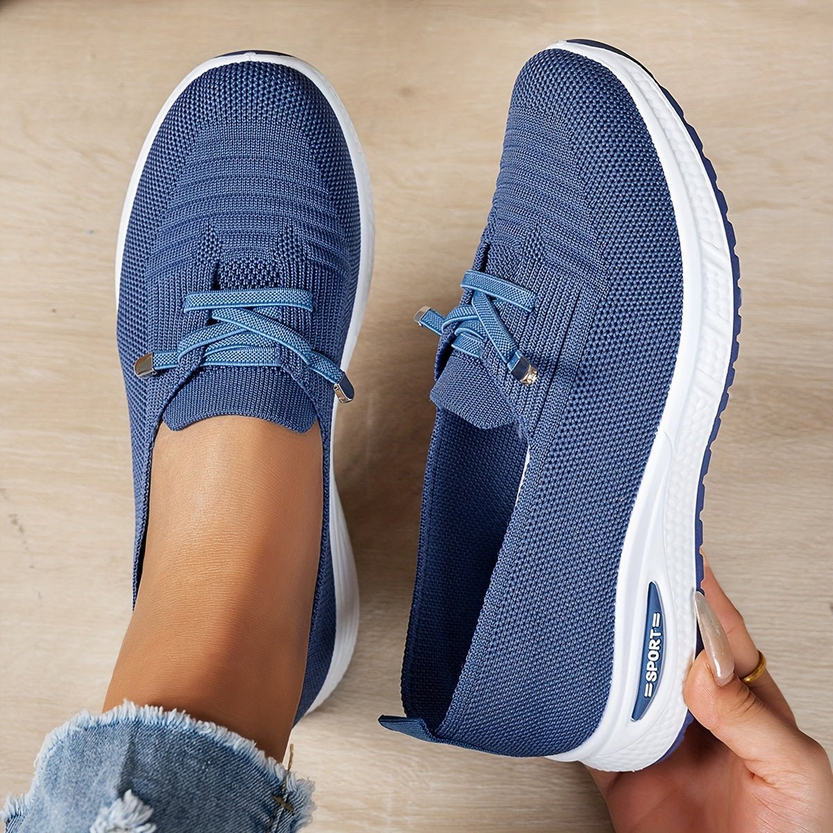 Black Louna™ ergonomic support sneakers by THE WHITMORE FAMILY, featuring cushioned insoles and supportive design for comfort.