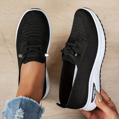 Black Louna™ ergonomic support sneakers by THE WHITMORE FAMILY featuring cushioned soles and supportive design for comfort.