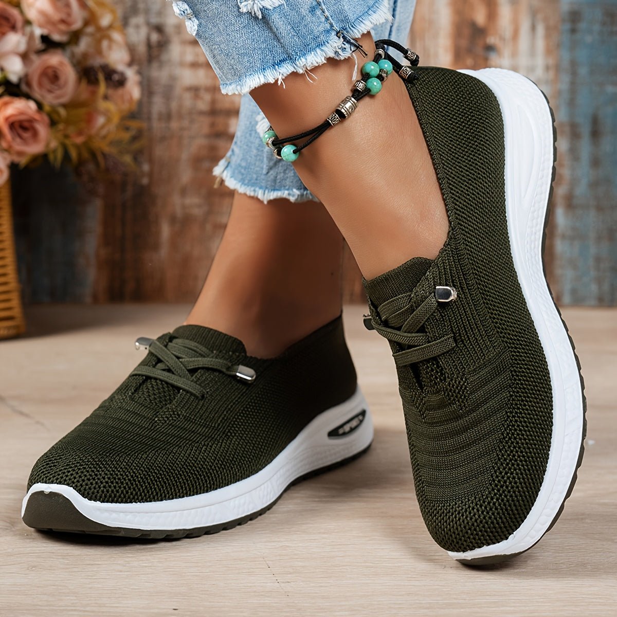 Black Louna™ ergonomic support sneakers by THE WHITMORE FAMILY featuring cushioned soles and supportive design for comfortable walking.