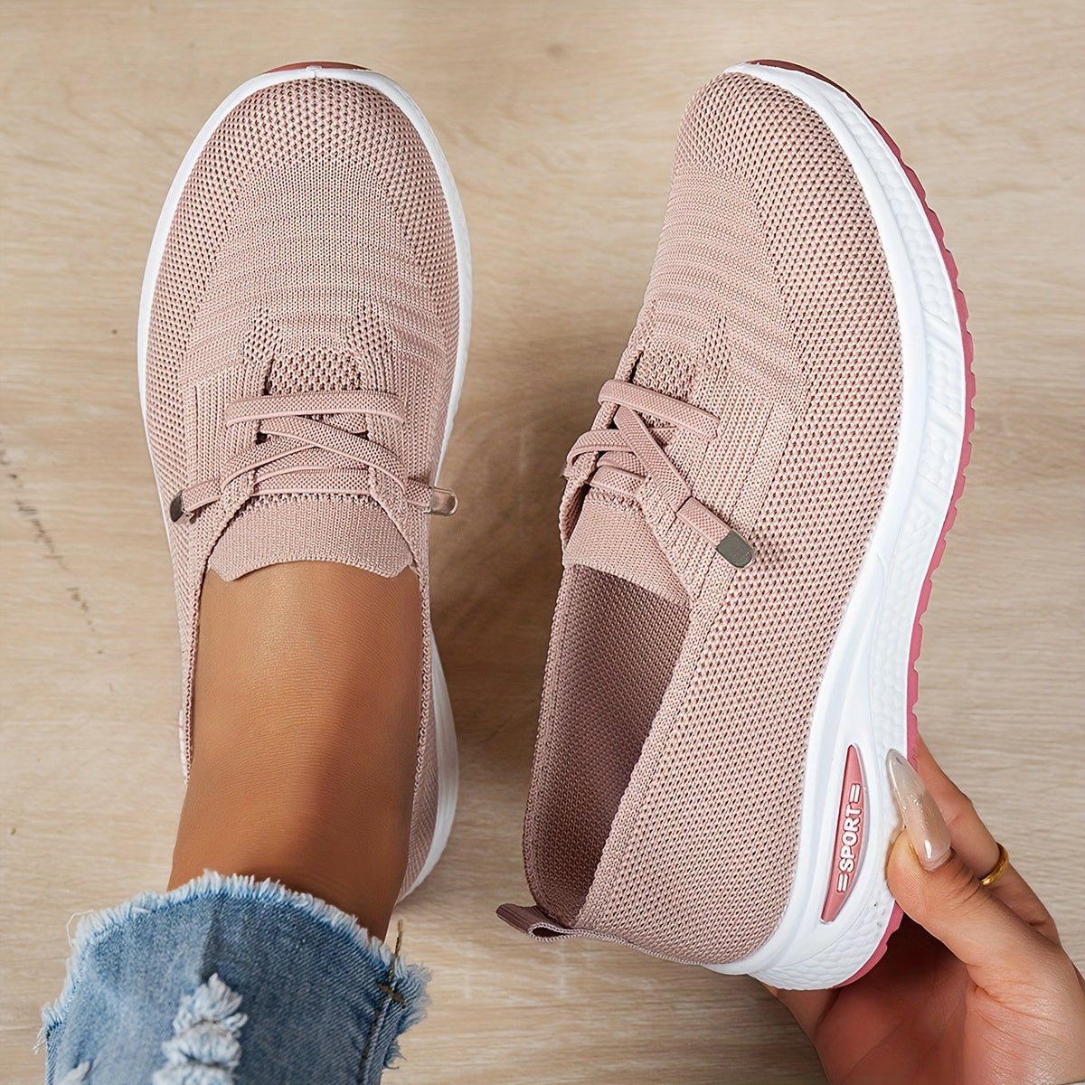 Black Louna™ ergonomic support sneakers by THE WHITMORE FAMILY with cushioned soles and breathable fabric for comfortable walking.