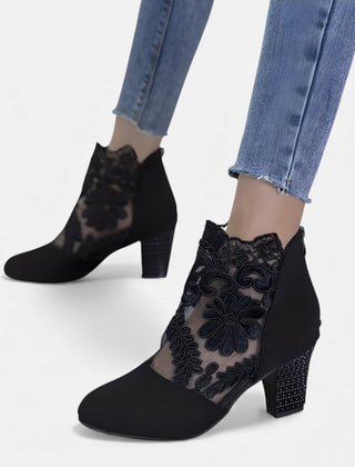 Black Norene stylish breathable orthopedic heels by THE WHITMORE FAMILY, showcasing a sleek design and comfortable fit.