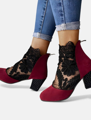 Black Norene orthopaedic heels by THE WHITMORE FAMILY, stylish and breathable footwear with supportive heel design.