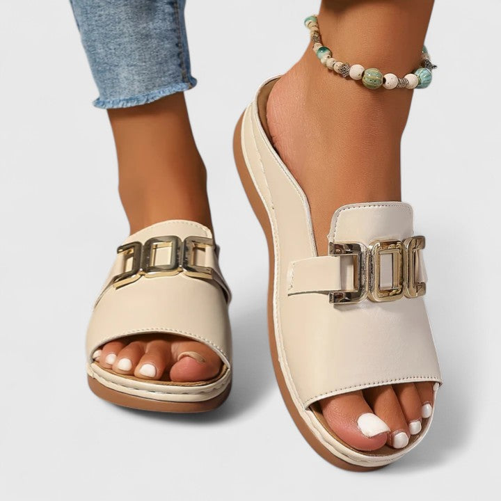 Black Sharpay™ sophisticated sandals by THE WHITMORE FAMILY with stylish straps and elegant design for women.