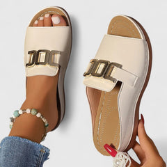 Black Sharpay™ sophisticated sandals by THE WHITMORE FAMILY featuring elegant straps and a stylish design.