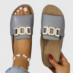 Black Sharpay™ sophisticated sandals by THE WHITMORE FAMILY with elegant straps and a stylish, modern design.