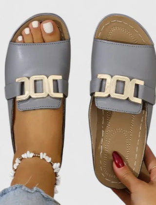 Black Sharpay™ sophisticated sandals by THE WHITMORE FAMILY with elegant straps and a stylish, modern design.