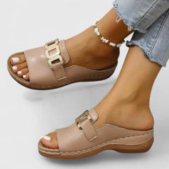Black Sharpay™ sophisticated sandals by THE WHITMORE FAMILY featuring sleek straps and elegant design for stylish wear.