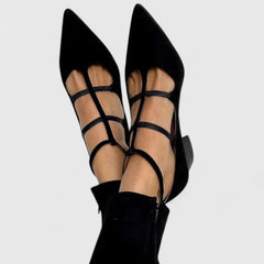 Black Sorelle Elegant Heels by THE WHITMORE FAMILY featuring a sleek design and pointed toe, perfect for formal occasions.