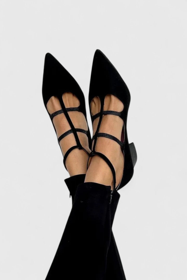 Black Sorelle Elegant Heels by THE WHITMORE FAMILY featuring a sleek design and pointed toe, perfect for formal occasions.
