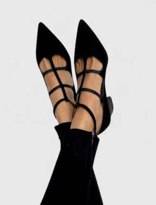 Black Sorelle Elegant Heels by THE WHITMORE FAMILY featuring sleek design and pointed toe, perfect for formal occasions.