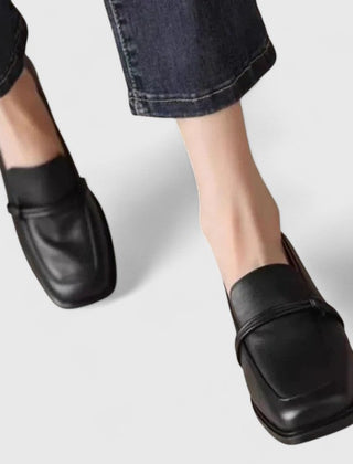 Black Dixie orthopedic loafers by THE WHITMORE FAMILY, featuring comfortable design and classic slip-on style for everyday wear.