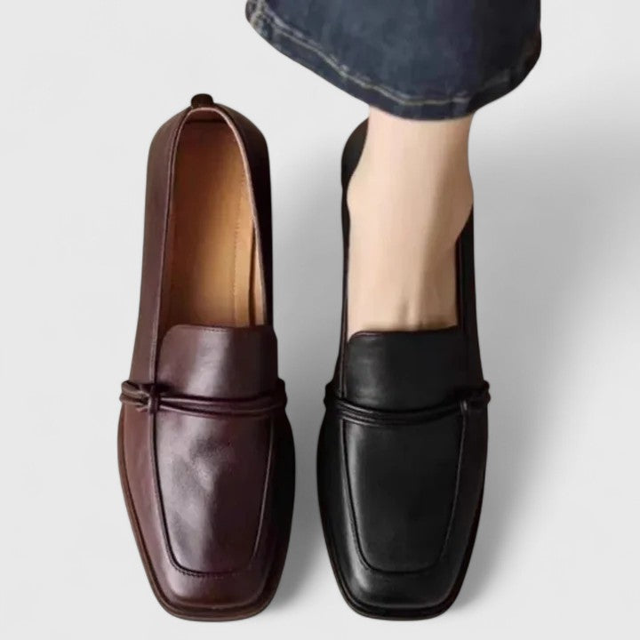 Black Dixie orthopedic loafers by THE WHITMORE FAMILY, featuring comfortable slip-on design and supportive sole for everyday wear.