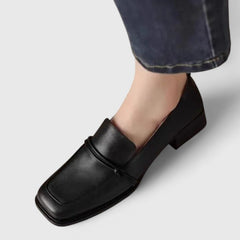 Black Dixie orthopedic loafers by THE WHITMORE FAMILY, shown in size 5 US / 36 EU, featuring a comfortable slip-on design.