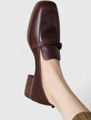 Black Dixie orthopedic loafers by THE WHITMORE FAMILY, showing a stylish, comfortable shoe design with slip-on style and supportive sole.
