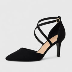 Black Veylah elegant heels from THE WHITMORE FAMILY featuring a sleek design and pointed toe on a neutral background.