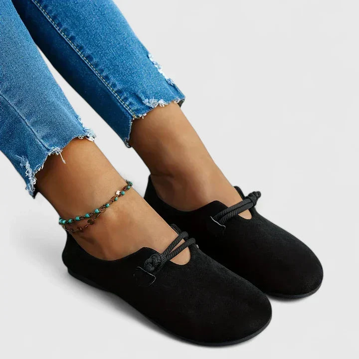 Black Ysavriann orthopedic loafers by THE WHITMORE FAMILY, featuring comfortable, supportive design with smooth leather finish.