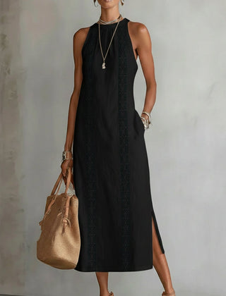Black Celine sleeveless lace detail midi dress by THE WHITMORE FAMILY displayed on a model. Elegant and stylish evening wear.