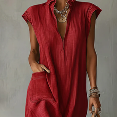 Black Elara Ruffle Spring Maxi Dress by THE WHITMORE FAMILY, flowing fabric with ruffle details for a stylish spring look.