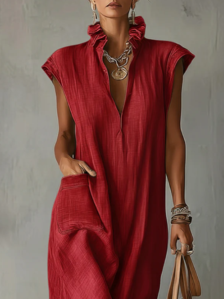 Black Elara Ruffle Spring Maxi Dress by THE WHITMORE FAMILY, flowing fabric with ruffle details for a stylish spring look.