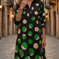 Black Kaia Dinner Walk Dress by THE WHITMORE FAMILY, featuring elegant fabric and tailored fit, displayed on a dress form.