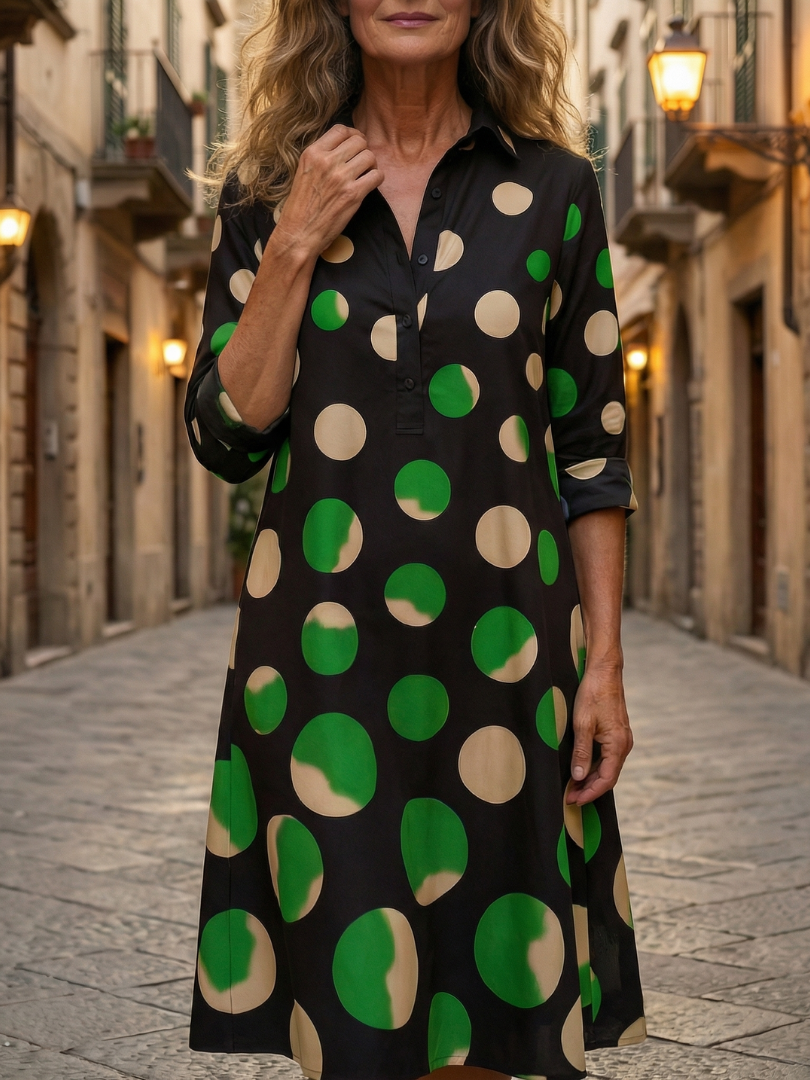 Black Kaia Dinner Walk Dress by THE WHITMORE FAMILY, featuring elegant fabric and tailored fit, displayed on a dress form.